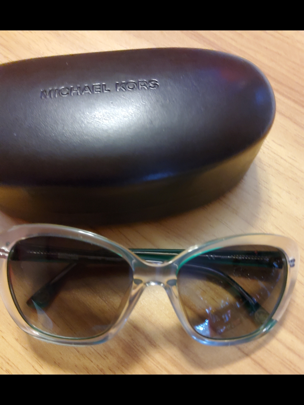 Michael Kors "Sabrina" sunglasses in the color Palmetto Green (307)